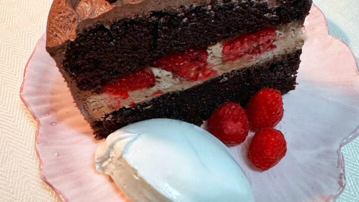 Chocolate fudge cake with chocolate mousse and raspberries